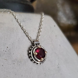 FACETED RHODOLITE GARNET PENDANT IN 14KT GOLD & STERLING SILVER