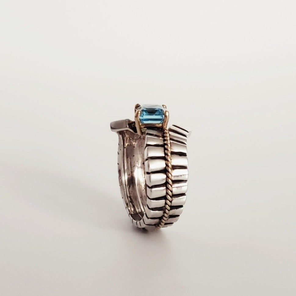 MODERN WITH A CLASSIC TWIST OF STERLING SILVER, BLUE TOPAZ WITH 14KT & 18KTGOLD