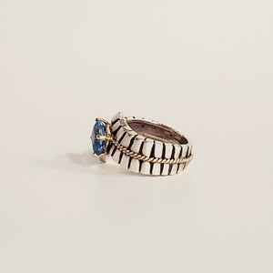 MODERN WITH A CLASSIC TWIST OF STERLING SILVER, BLUE TOPAZ WITH 14KT & 18KTGOLD