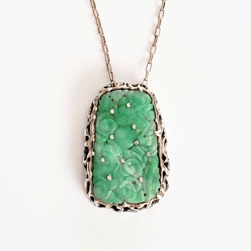 SCULPTED JADE & DIAMOND PENDANT MODELED IN STERLING SILVER